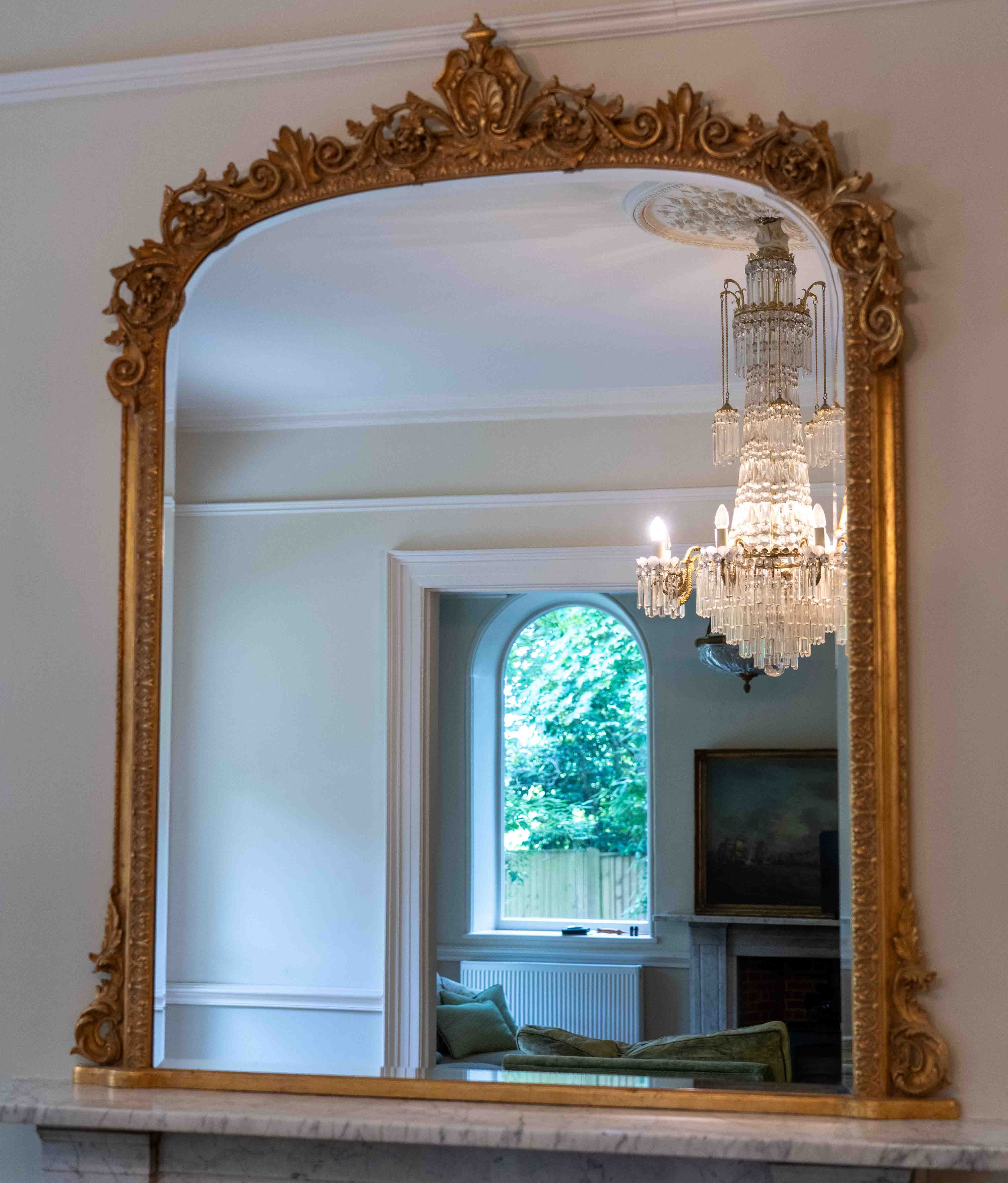 A Victorian style giltwood and composition overmantel mirror, width 138cm, height 180cm. Condition - good